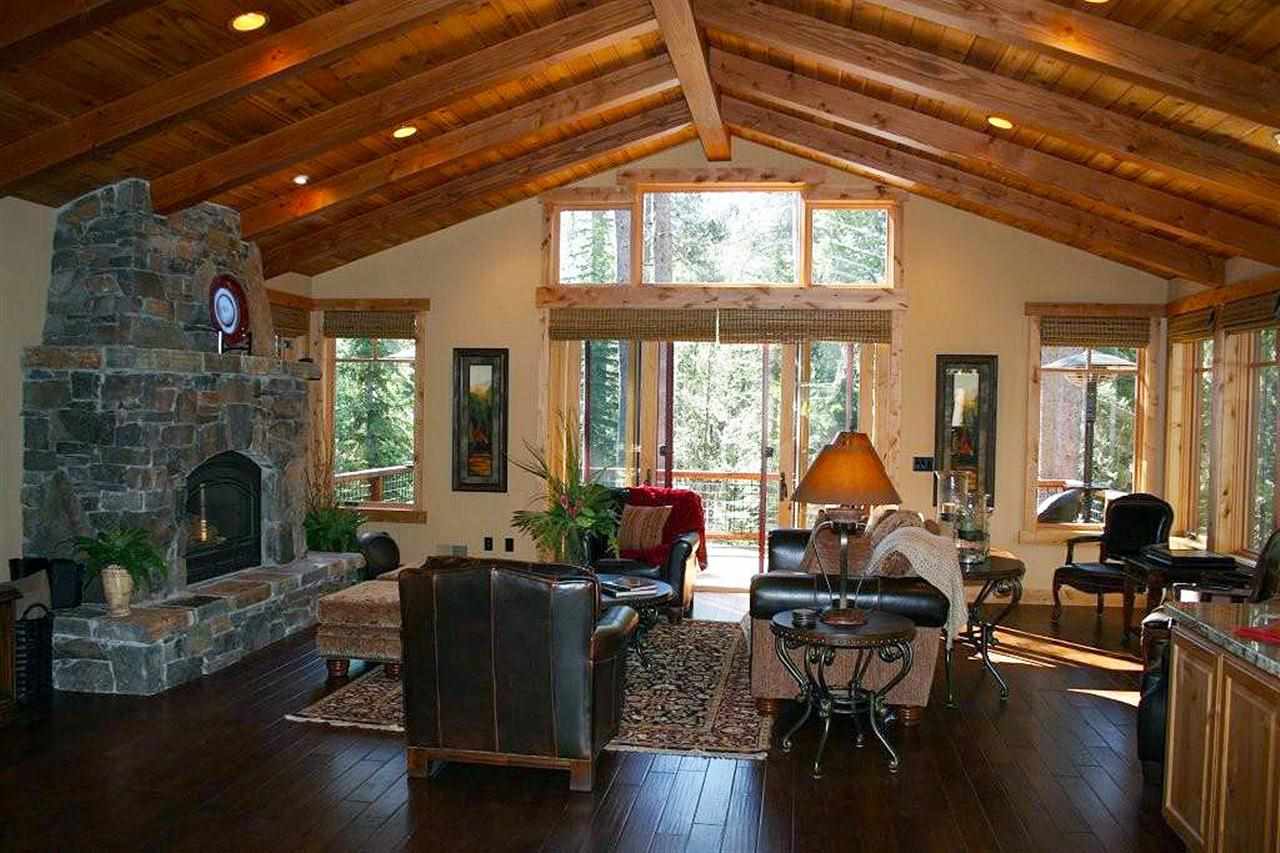 11563 Sun Valley Road Truckee, CA 96161 - Photo 13 of 14 a living room with furniture a fireplace and wooden floor