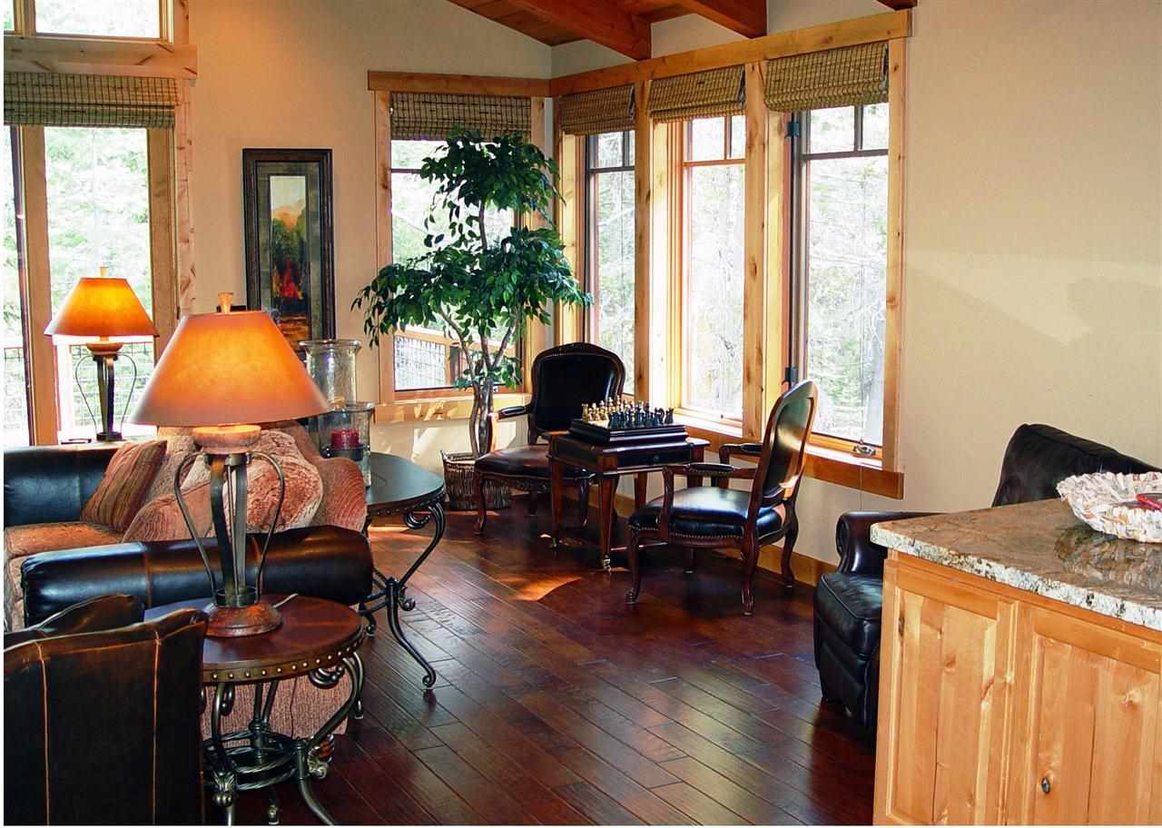 11563 Sun Valley Road Truckee, CA 96161 - Photo 2 of 14 a living room with furniture and floor to ceiling windows