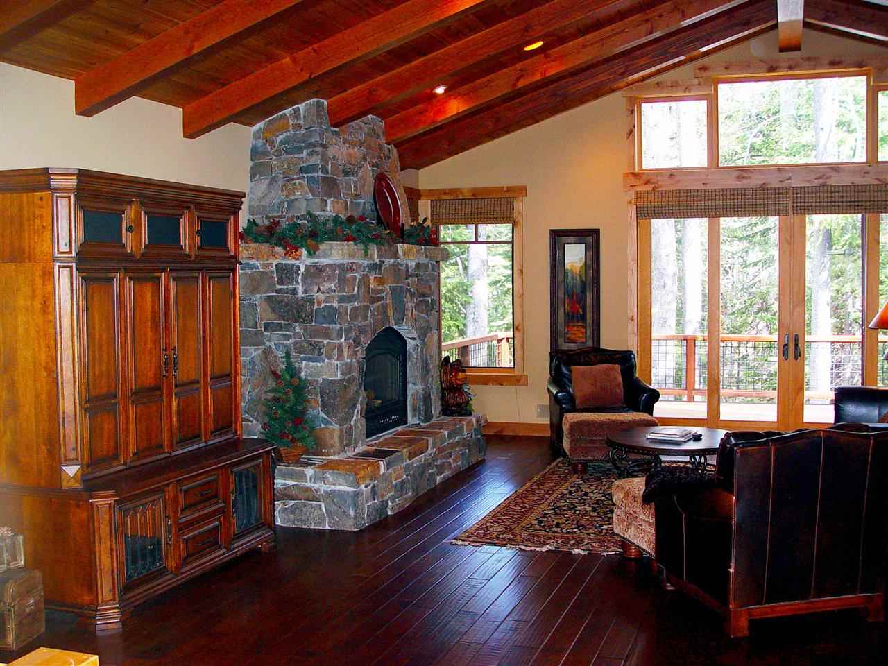 11563 Sun Valley Road Truckee, CA 96161 - Photo 4 of 14 a living room with furniture fireplace and flat screen tv