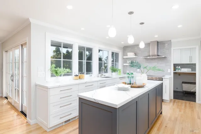 a kitchen with a sink and cabinets