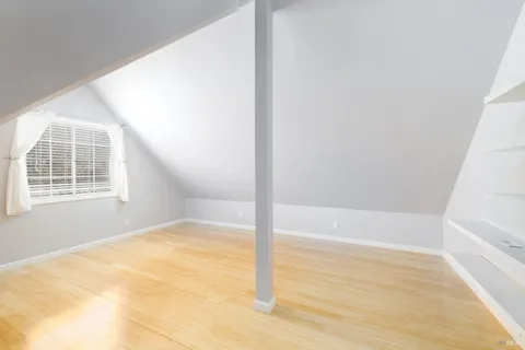 a kitchen with a sink cabinets and appliances