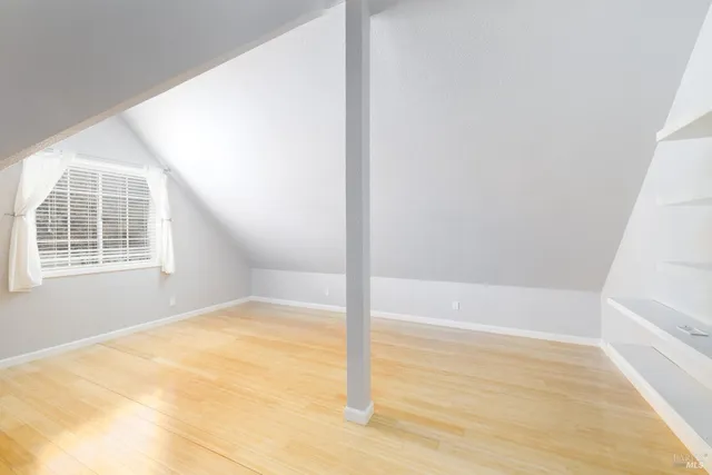 a kitchen with a sink cabinets and appliances