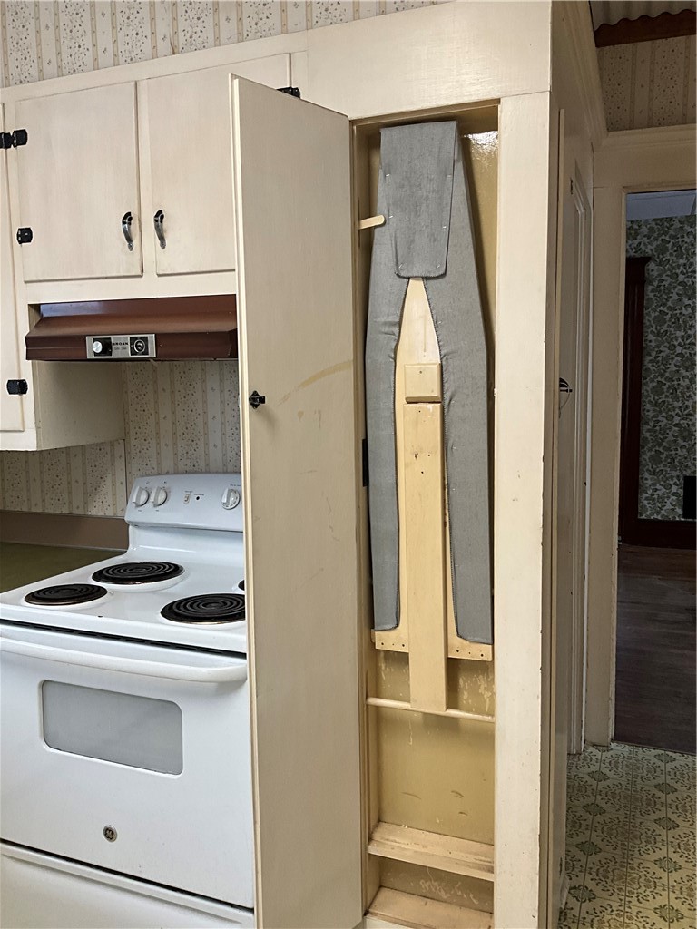 956 Main Street Locke, NY 13092 - Photo 14 of 33 Hidden ironing board