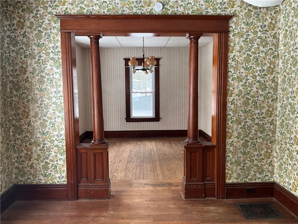 956 Main Street Locke, NY 13092 - Photo 17 of 33 Columns into the formal dining room