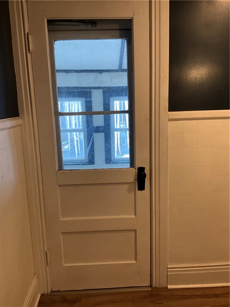 956 Main Street Locke, NY 13092 - Photo 21 of 33 Enclosed upstairs Sleeping porch through the bathr