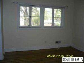 5200 Manning Road Charlotte, NC 28269 - Photo 3 of 4 an empty room with a window