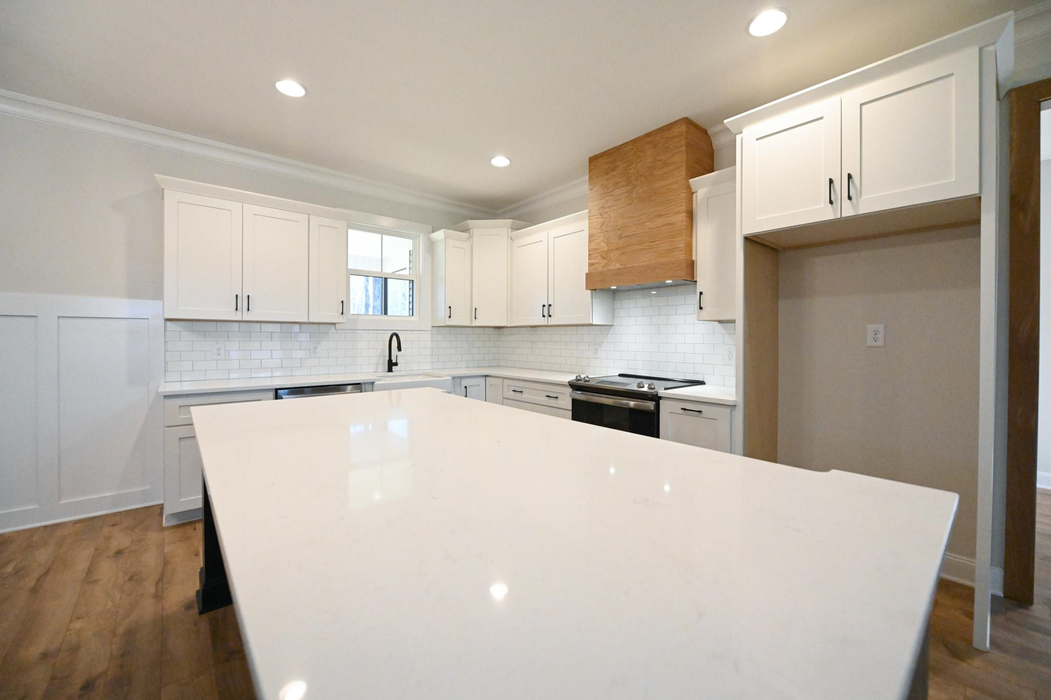 996 Barnes Road Middlesex, NC 27557 - Photo 11 of 39 a kitchen with a sink a stove and cabinets