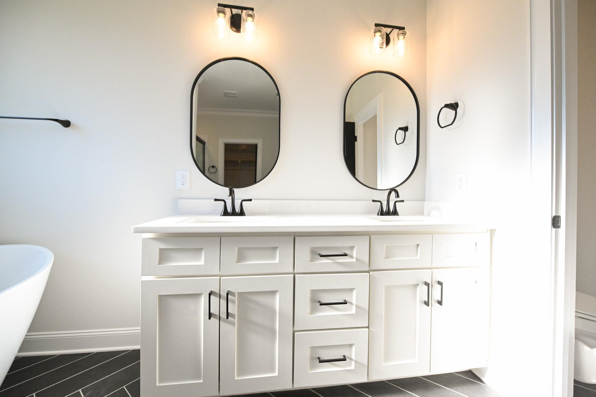 996 Barnes Road Middlesex, NC 27557 - Photo 24 of 39 a bathroom with a sink and a mirror