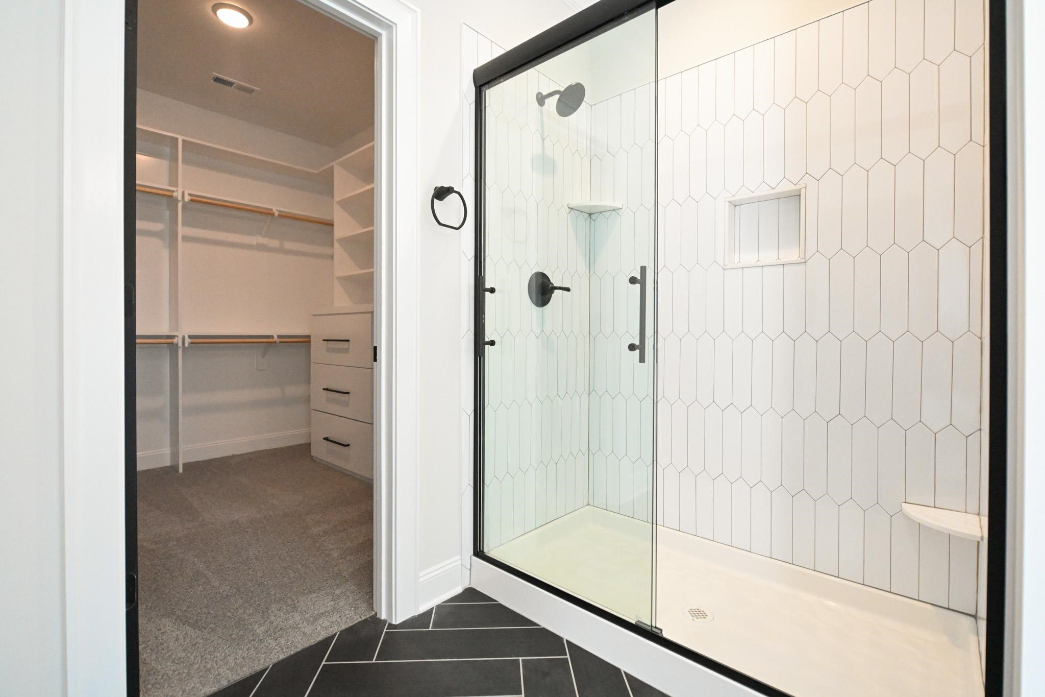 996 Barnes Road Middlesex, NC 27557 - Photo 28 of 39 a bathroom with a shower and a glass door