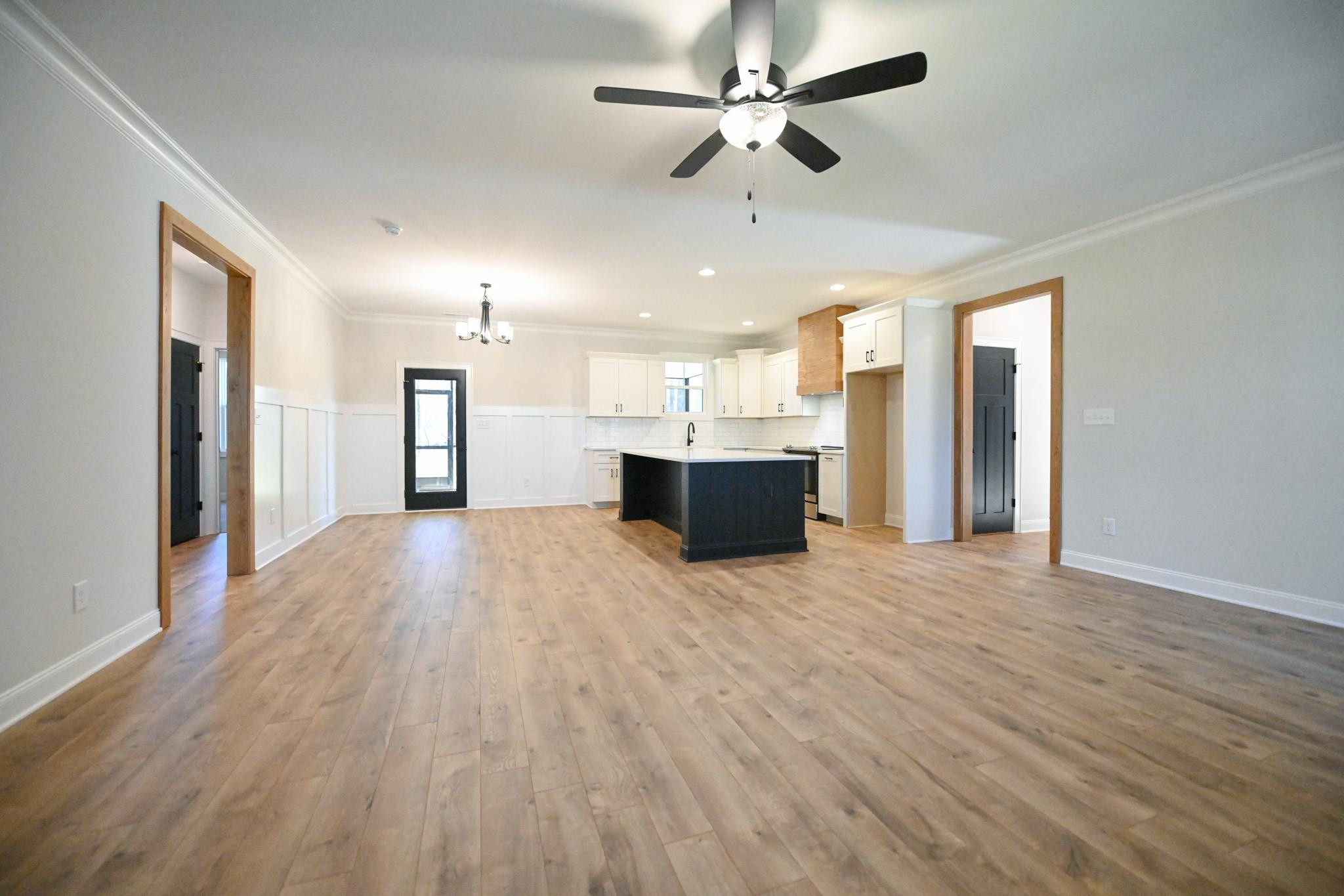996 Barnes Road Middlesex, NC 27557 - Photo 8 of 39 a view of empty room with wooden floor and fan