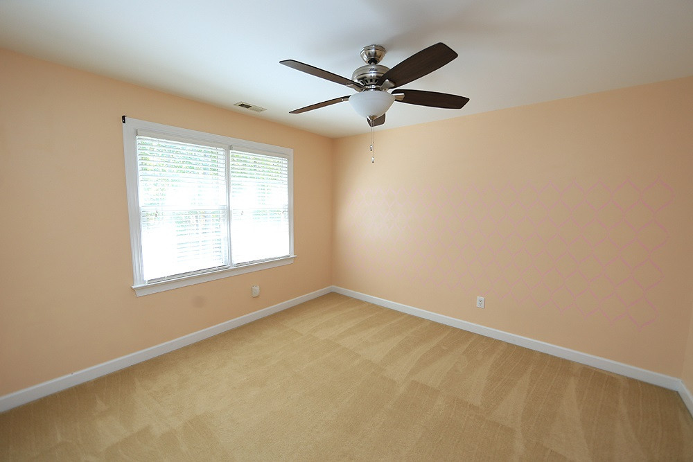 5921 Wild Orchid Trail Raleigh, NC 27613 - Photo 20 of 30 One of three secondary bedrooms with ceiling fan. Bedroom