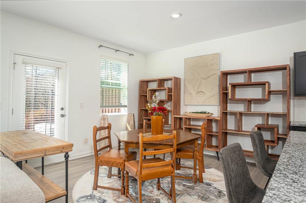 5760 Flint Lane Cumming, GA 30028 - Photo 12 of 39 a view of a dining room with furniture