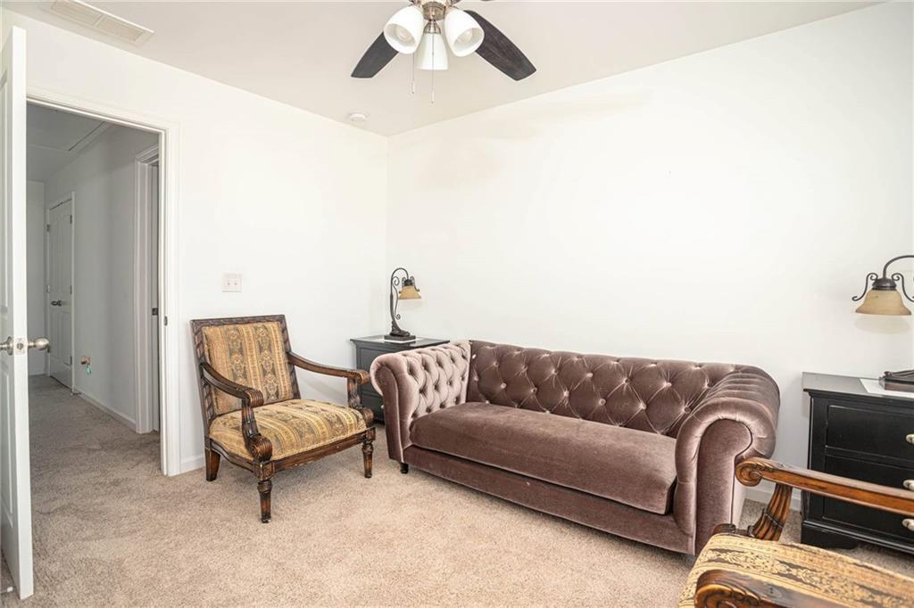 5760 Flint Lane Cumming, GA 30028 - Photo 26 of 39 a living room with furniture