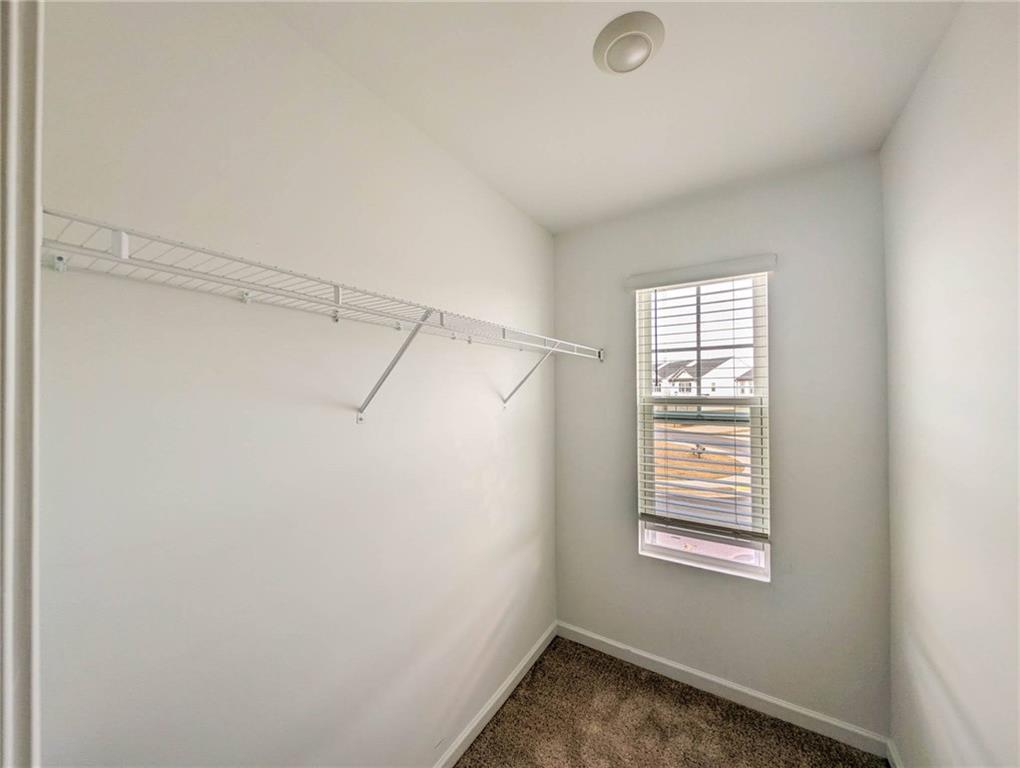 5760 Flint Lane Cumming, GA 30028 - Photo 30 of 39 a view of a room that has a window in it