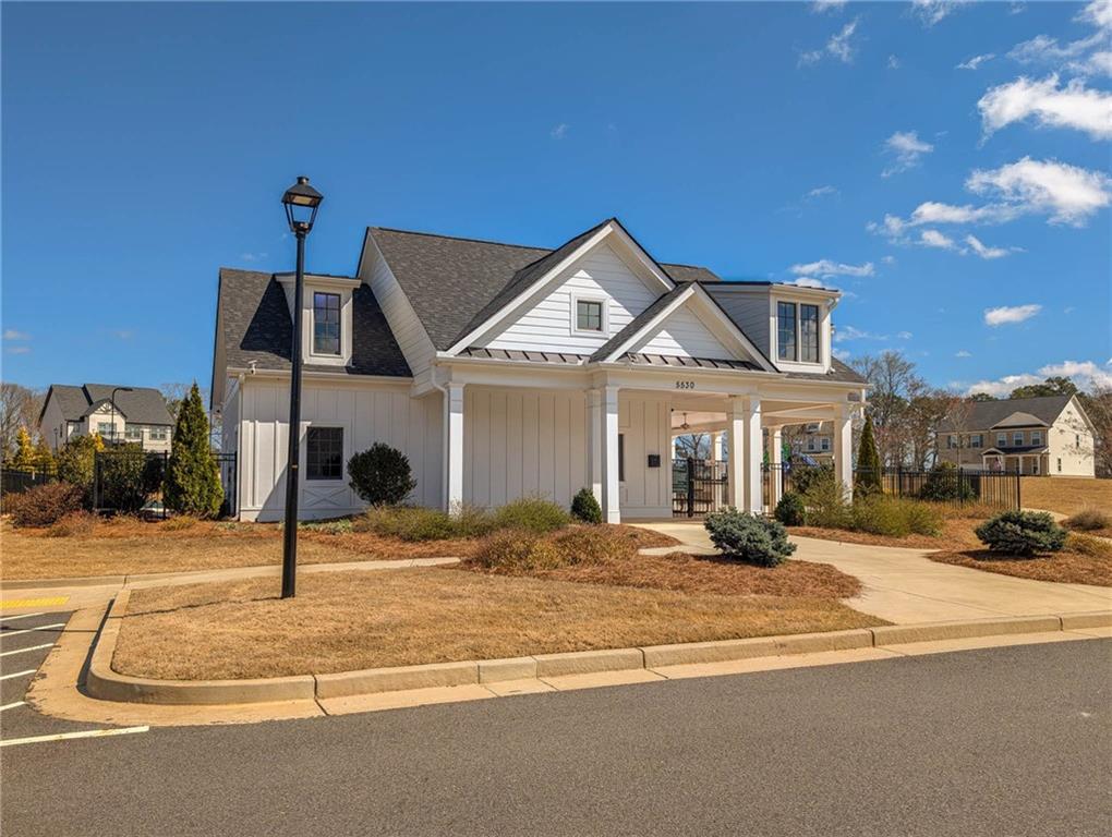 5760 Flint Lane Cumming, GA 30028 - Photo 35 of 39 a front view of a house with a porch