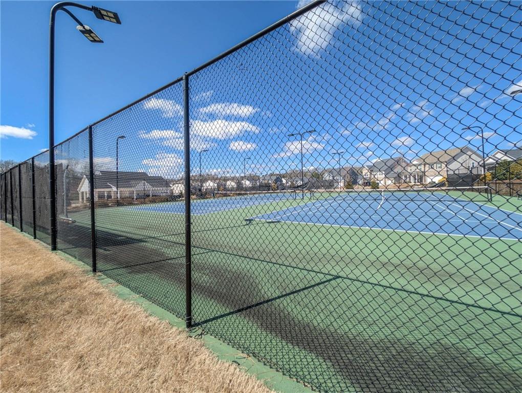 5760 Flint Lane Cumming, GA 30028 - Photo 37 of 39 a view of a tennis court