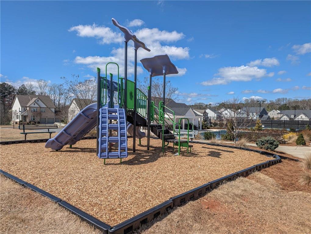 5760 Flint Lane Cumming, GA 30028 - Photo 38 of 39 a view of a park with a slide
