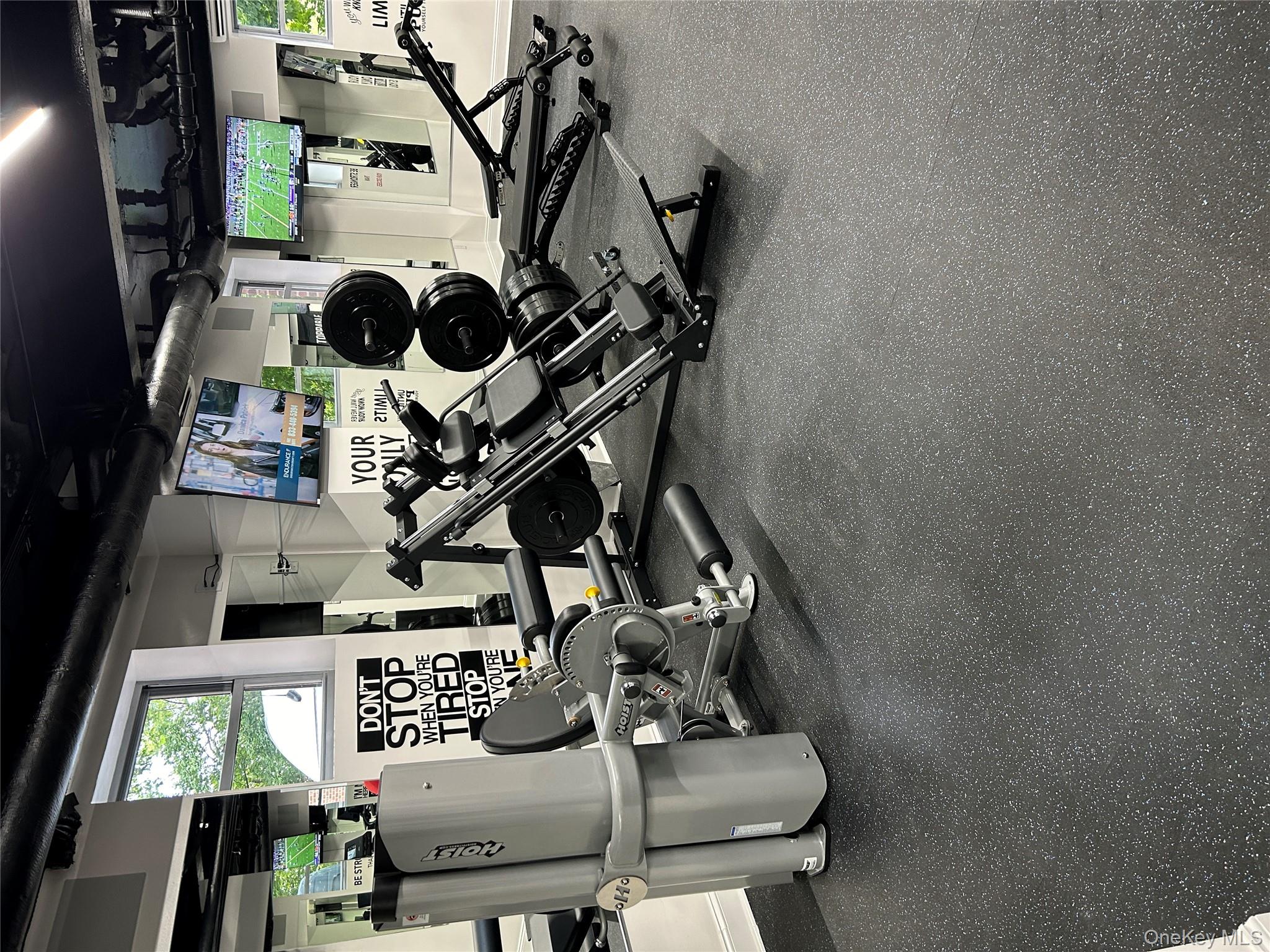 220 Pelham Road, Unit 6G New Rochelle, NY 10805 - Photo 12 of 24 a room with gym equipment and large window