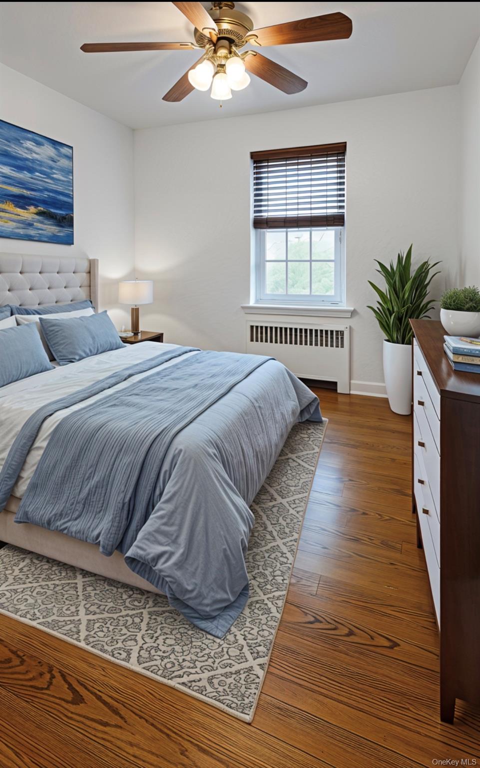 220 Pelham Road, Unit 6G New Rochelle, NY 10805 - Photo 7 of 24 a bedroom with a bed and a window