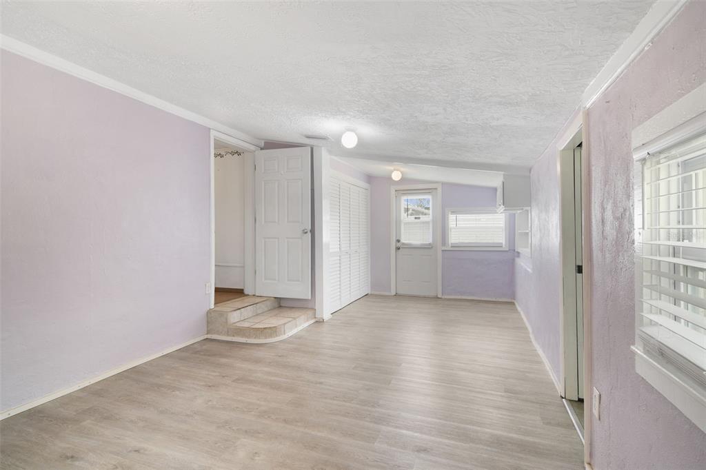 916 Fernald Street Edgewater, FL 32132 - Photo 17 of 27 a view of entryway with wooden floor