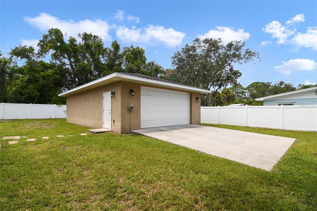 916 Fernald Street Edgewater, FL 32132 - Photo 20 of 27 a view of backyard with outdoor space