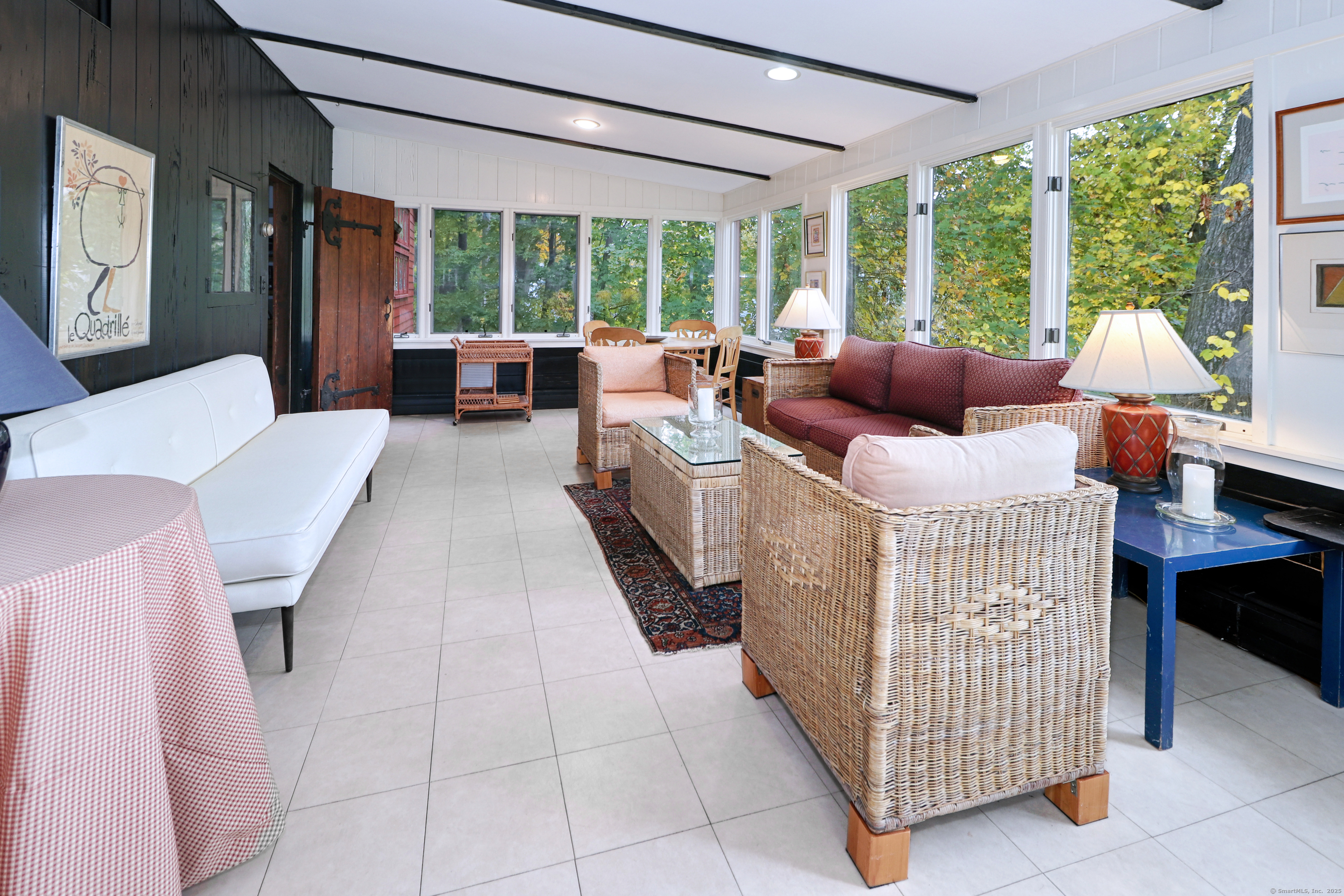 23 Bridge Street Westport, CT 06880 - Photo 10 of 39 a living room with furniture and large windows