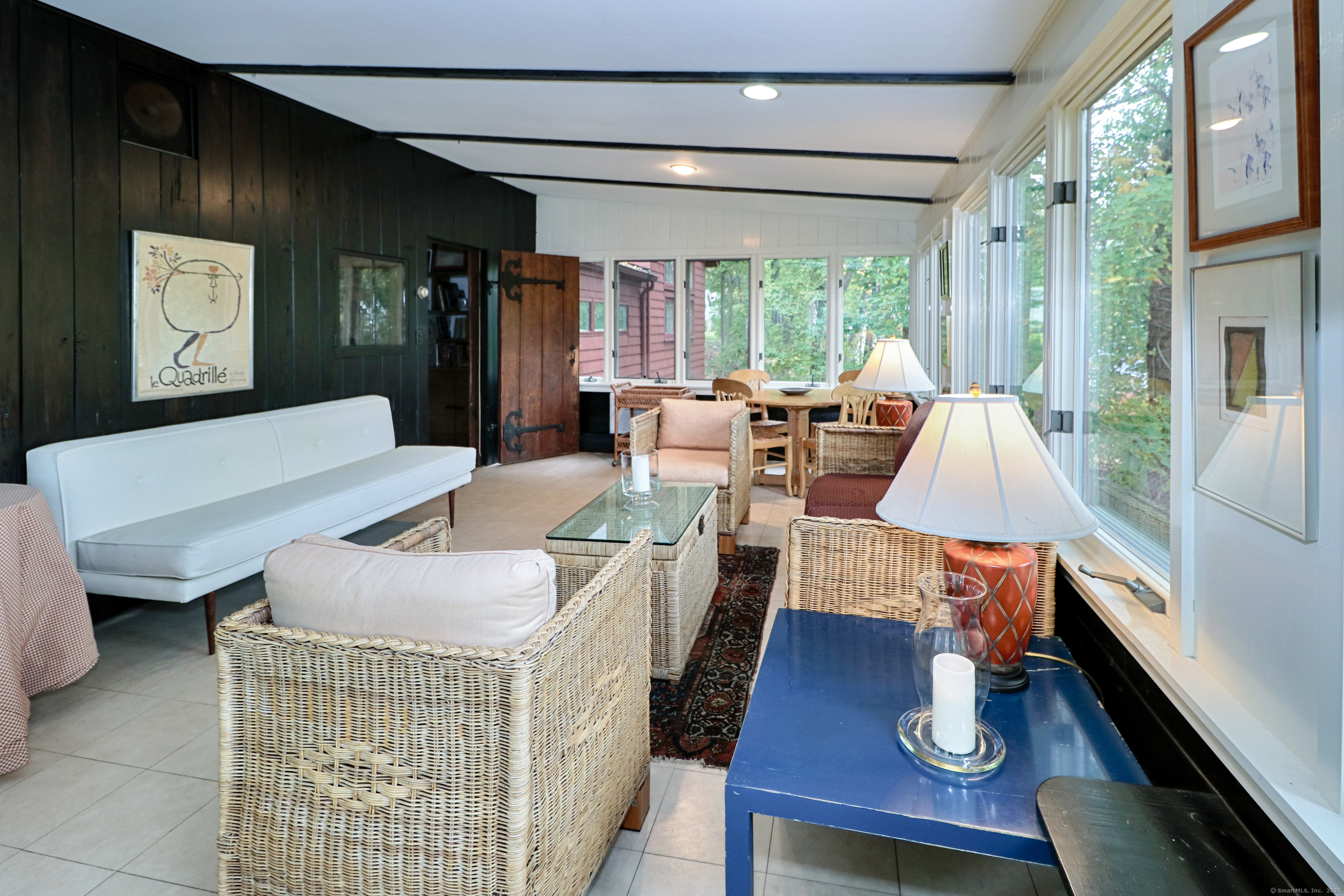 23 Bridge Street Westport, CT 06880 - Photo 11 of 39 a living room with furniture and a flat screen tv