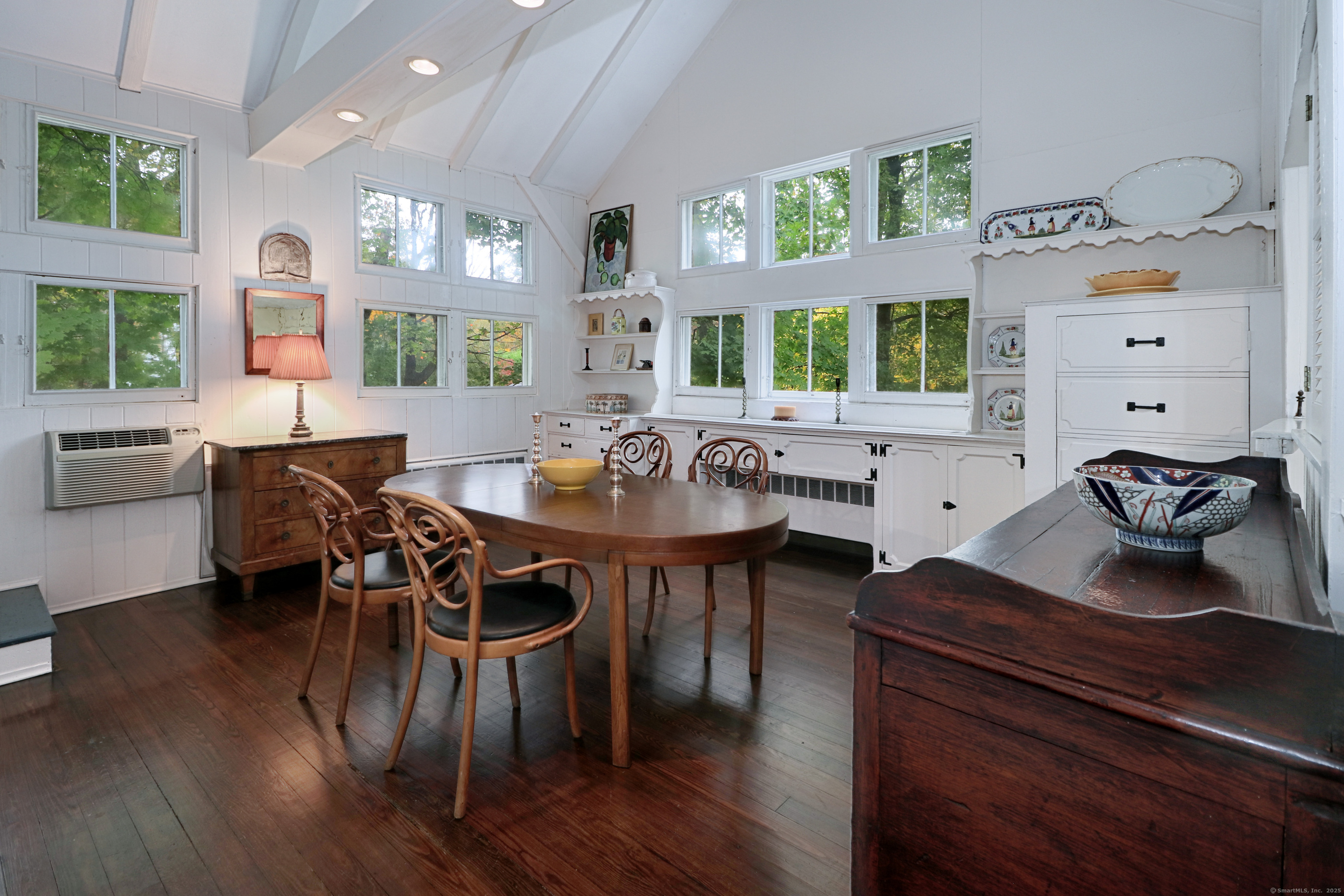 23 Bridge Street Westport, CT 06880 - Photo 15 of 39 a view of a dining room with furniture window and wooden floor