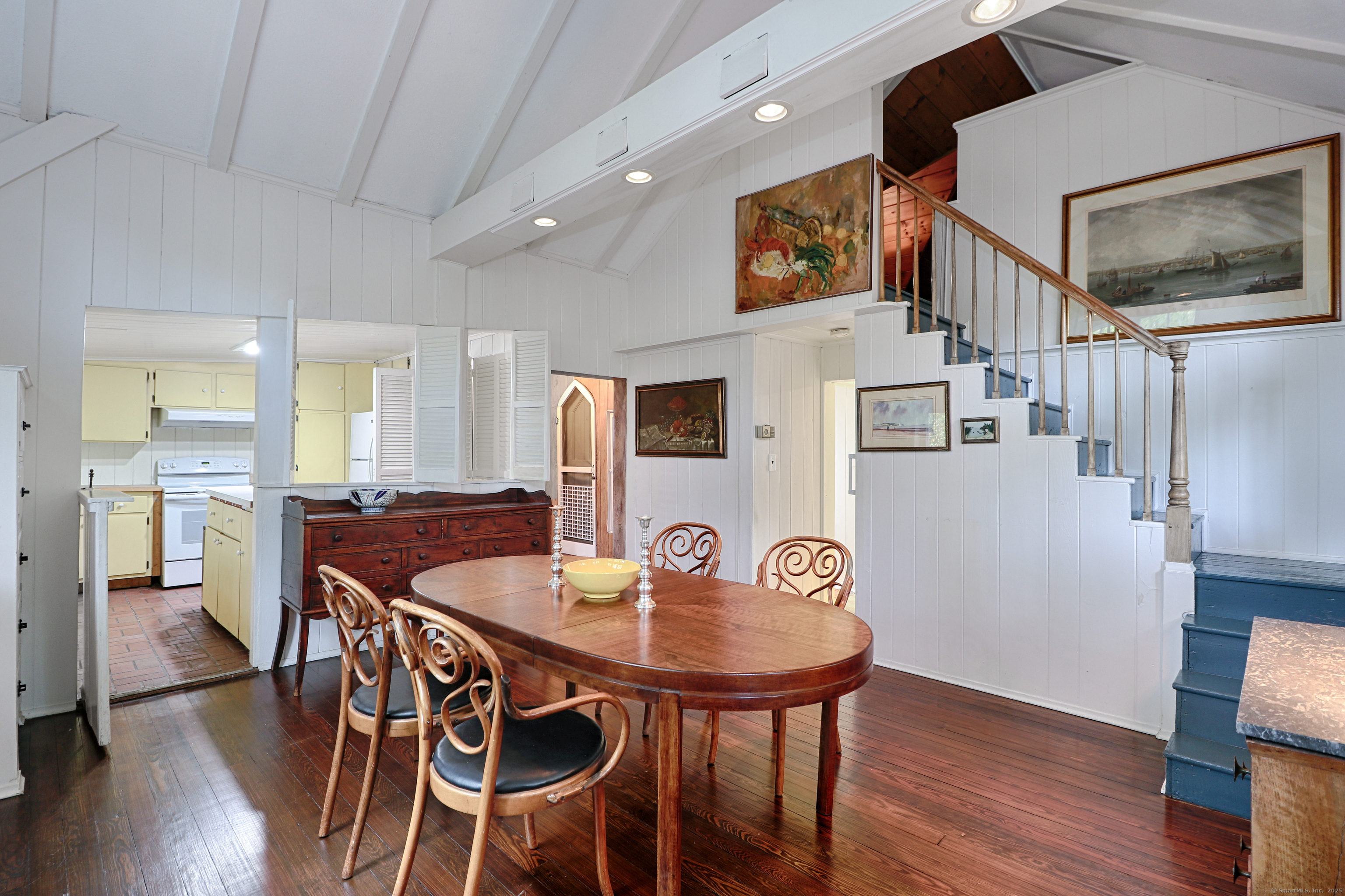 23 Bridge Street Westport, CT 06880 - Photo 17 of 39 a view of a dining room with furniture and wooden floor