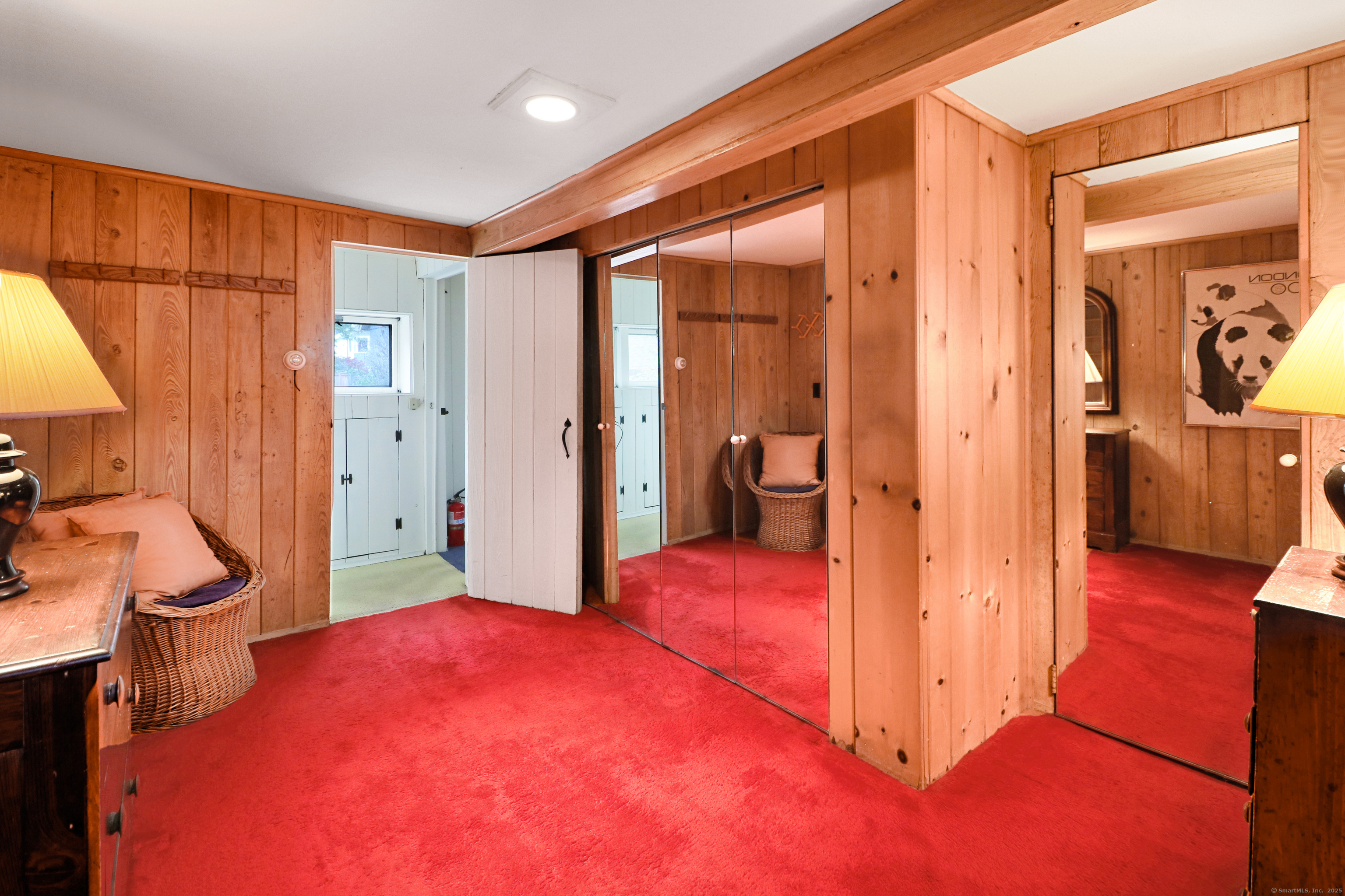 23 Bridge Street Westport, CT 06880 - Photo 23 of 39 a bedroom with a bed and a view of bathroom