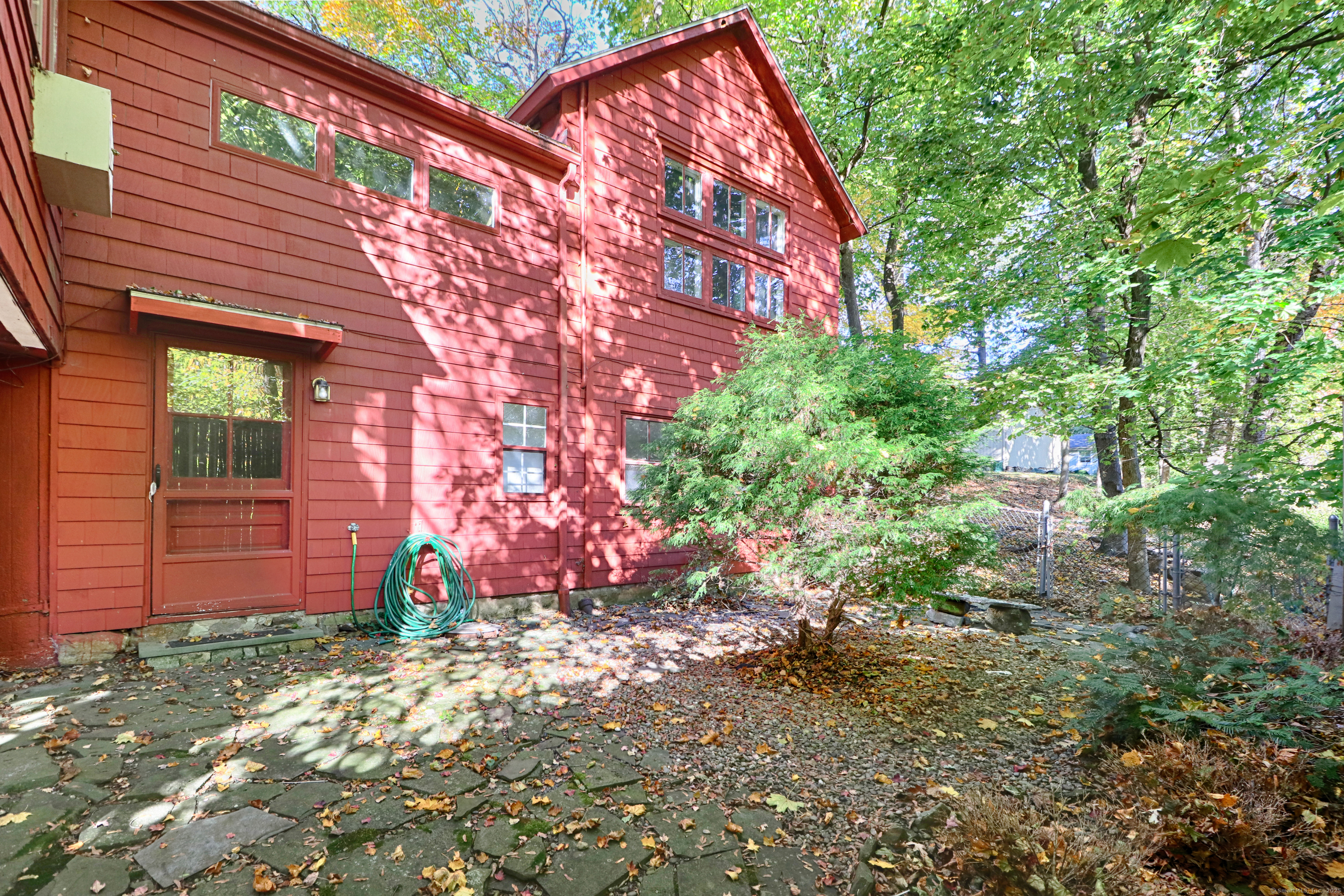 23 Bridge Street Westport, CT 06880 - Photo 31 of 39 a front view of a house with a yard