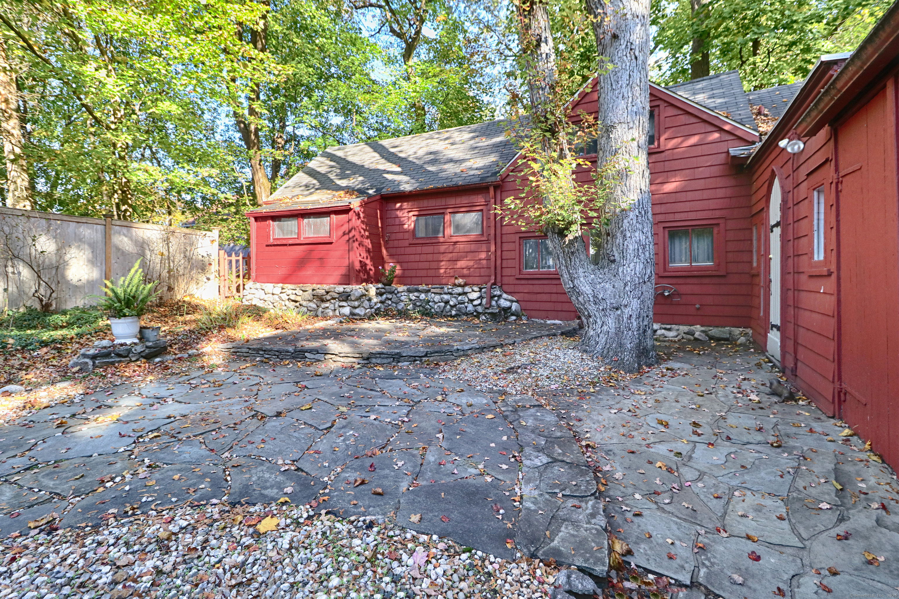 23 Bridge Street Westport, CT 06880 - Photo 4 of 39 a front view of a house with garden