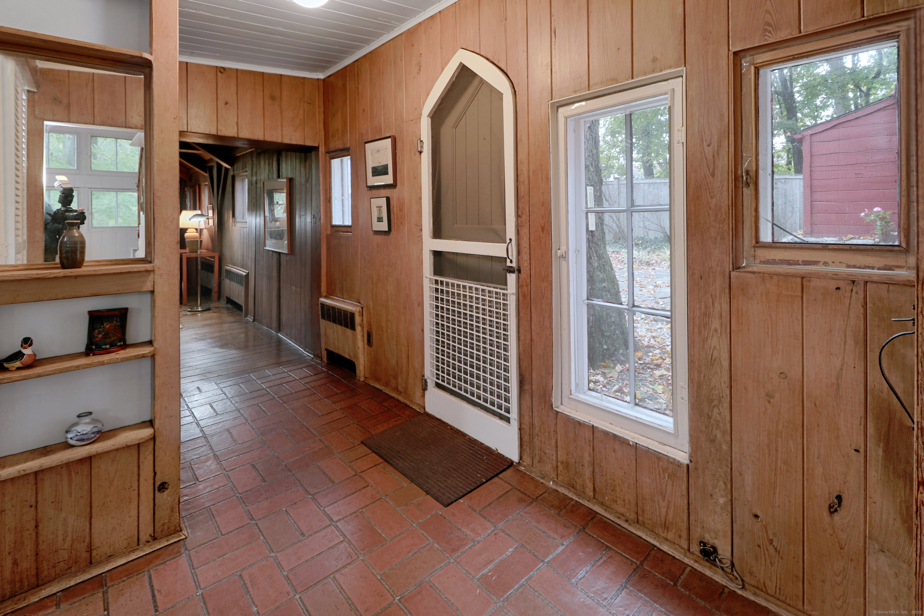 23 Bridge Street Westport, CT 06880 - Photo 6 of 39 a view of a hallway with wooden floor and windows