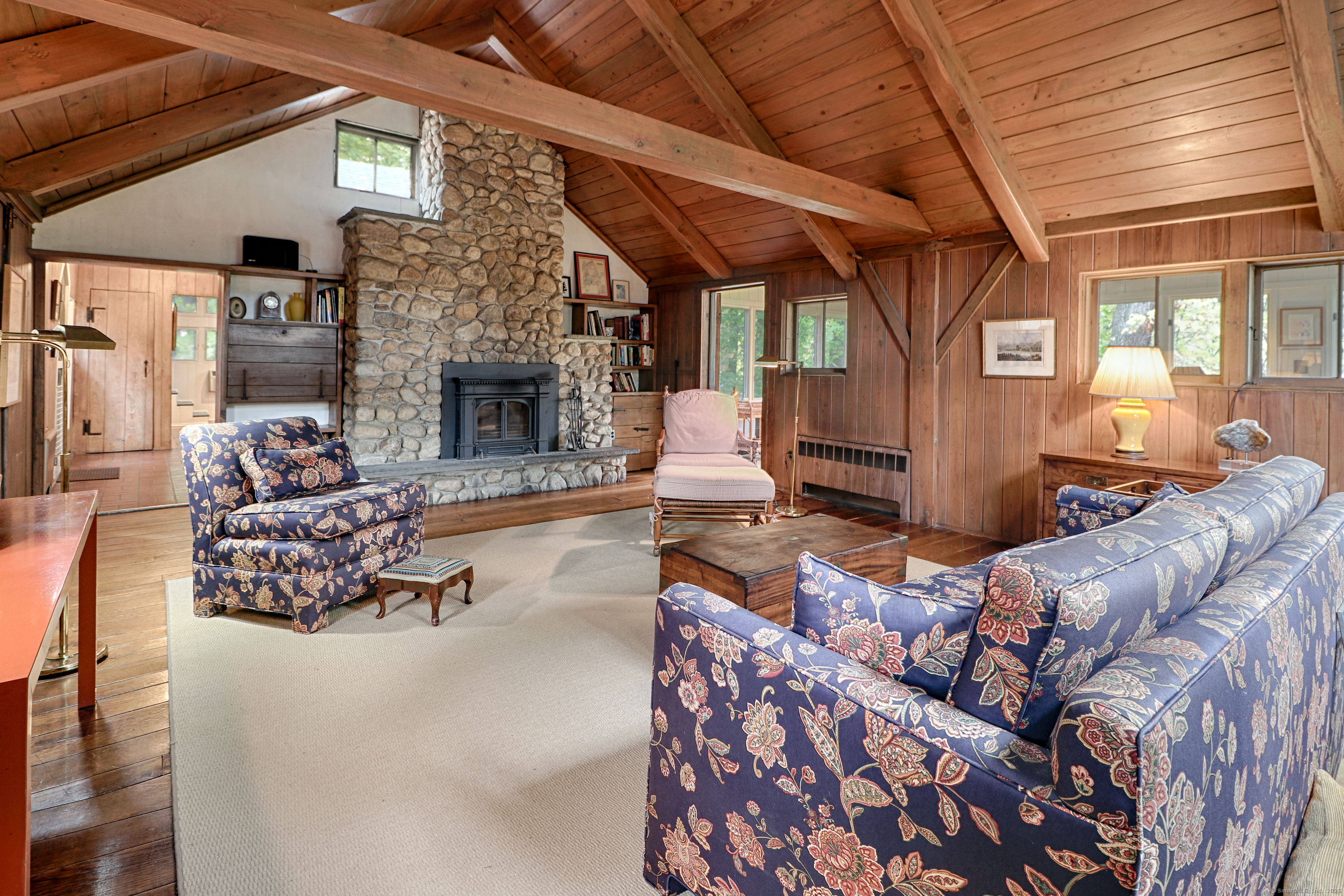 23 Bridge Street Westport, CT 06880 - Photo 7 of 39 a outdoor living space with patio furniture and a fireplace