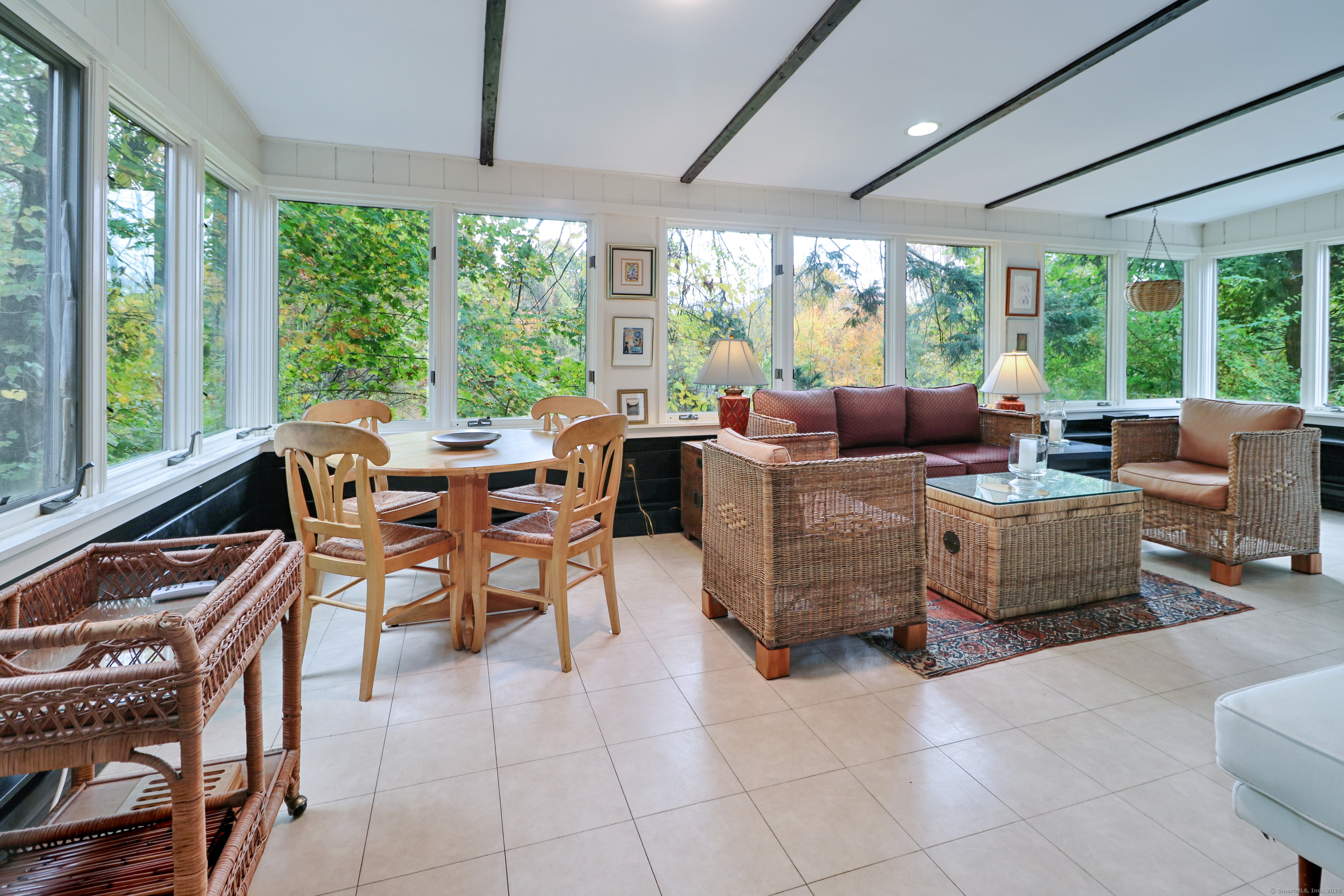 23 Bridge Street Westport, CT 06880 - Photo 9 of 39 a living room with furniture and large windows
