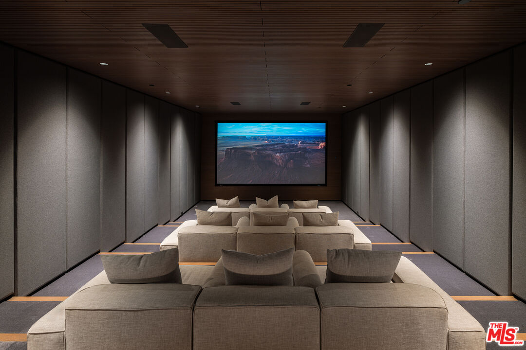 684 Firth Avenue Los Angeles, CA 90049 - Photo 15 of 27 a projector room with furniture