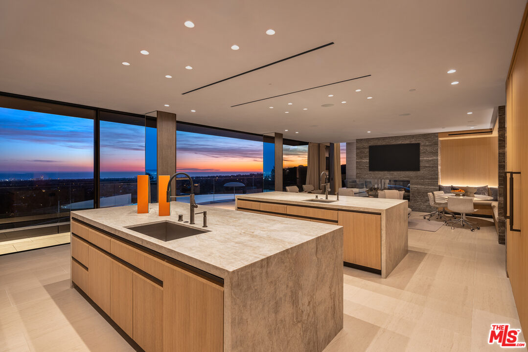 684 Firth Avenue Los Angeles, CA 90049 - Photo 16 of 27 a kitchen with lots of counter top space