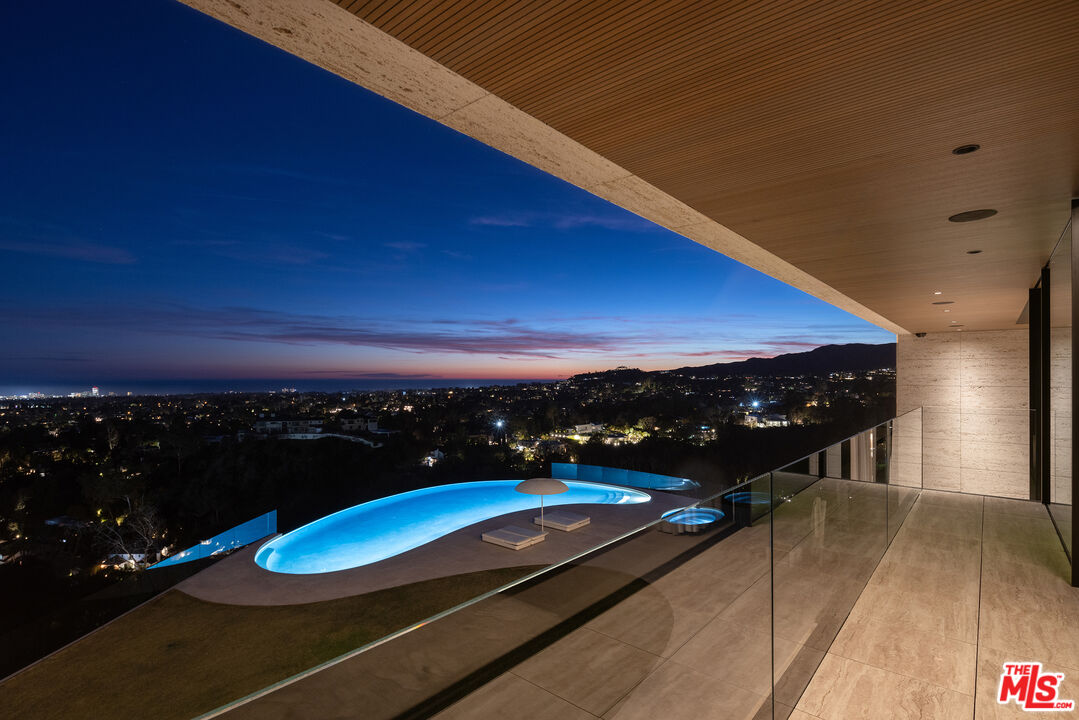 684 Firth Avenue Los Angeles, CA 90049 - Photo 23 of 27 a view of a balcony with an outdoor space