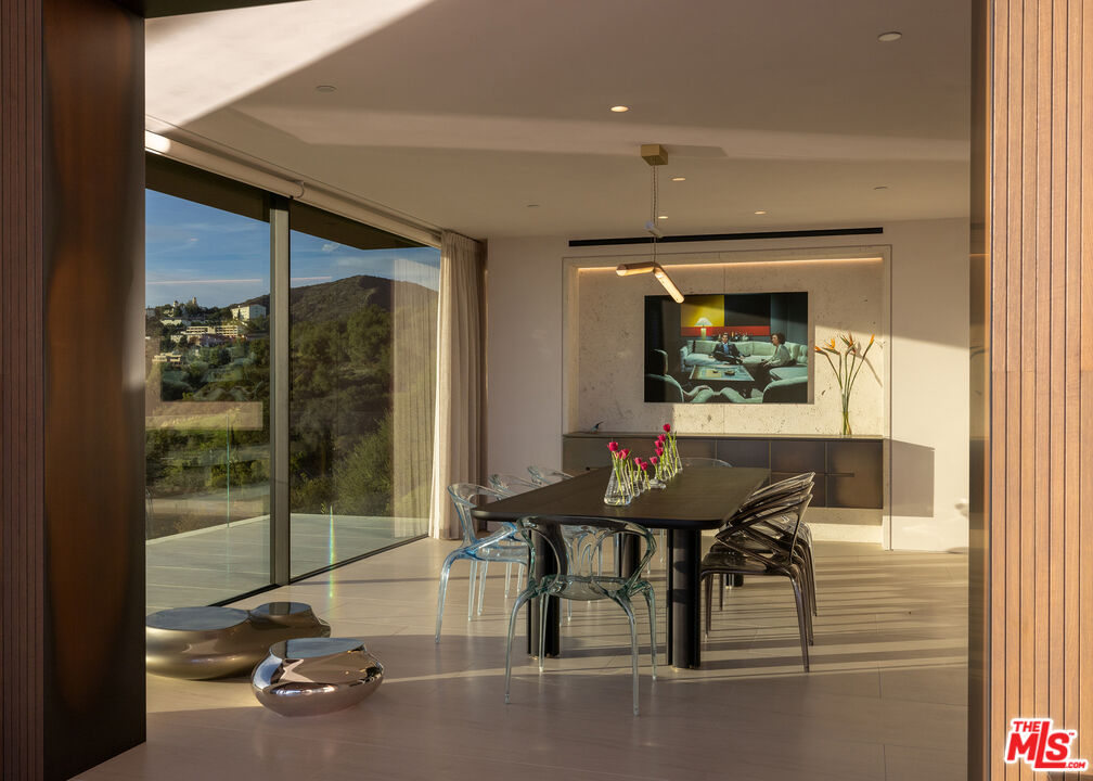 684 Firth Avenue Los Angeles, CA 90049 - Photo 8 of 27 a view of a workspace with furniture