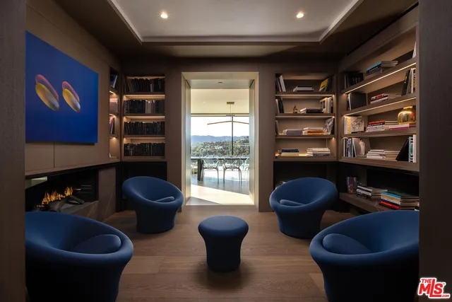 a kitchen with a table and chairs