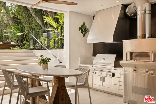 a view of balcony with furniture