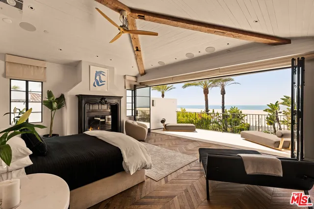 a dining room with furniture window and wooden floor