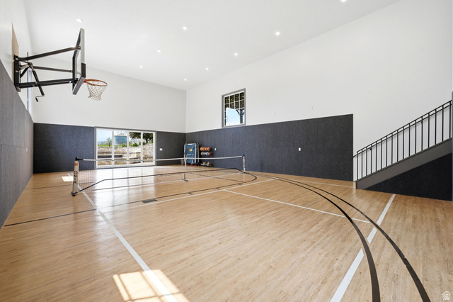 71 Farm Road Midway, UT 84049 - Photo 44 of 92 Indoor sports court featuring hardwood flooring with court markings, a basketball hoop, and a portable net