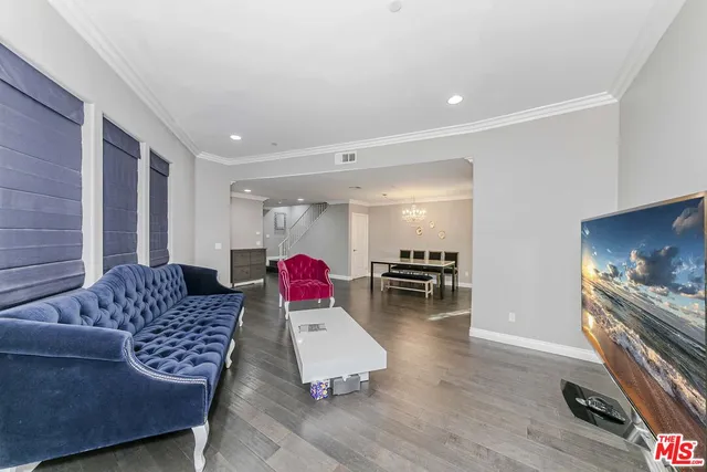 a living room with furniture and a couch