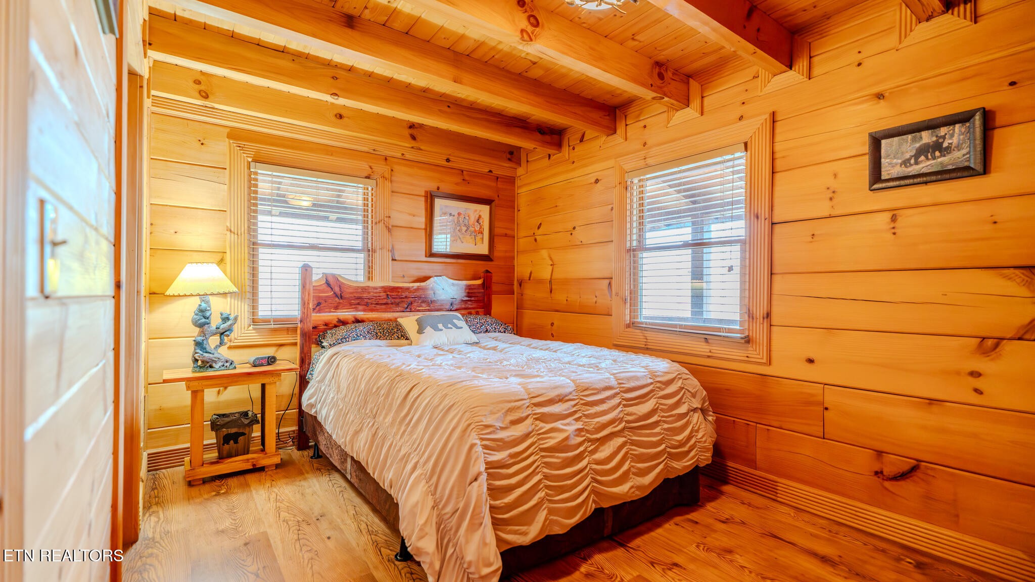 336 John J Smith Road Oneida, TN 37841 - Photo 27 of 60 a bed sitting in a bedroom next to a window
