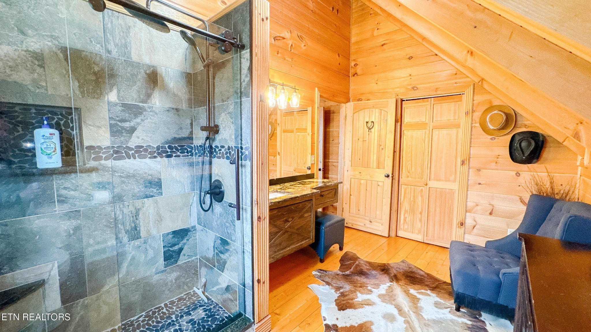 336 John J Smith Road Oneida, TN 37841 - Photo 33 of 60 a bathroom with a tub and a shower