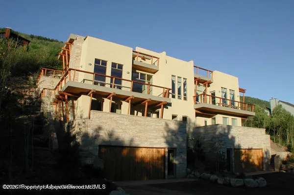 a front view of a building with balcony