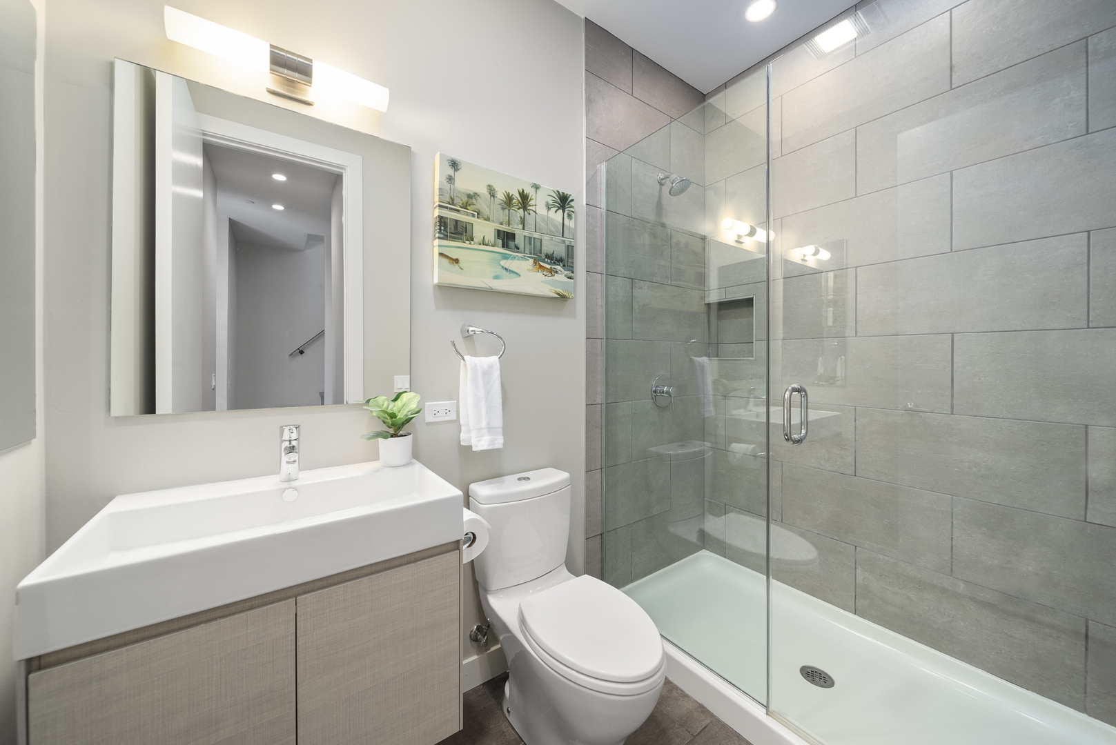 448 West Oak Street Chicago, IL 60610 - Photo 21 of 28 a bathroom with a sink a toilet and shower