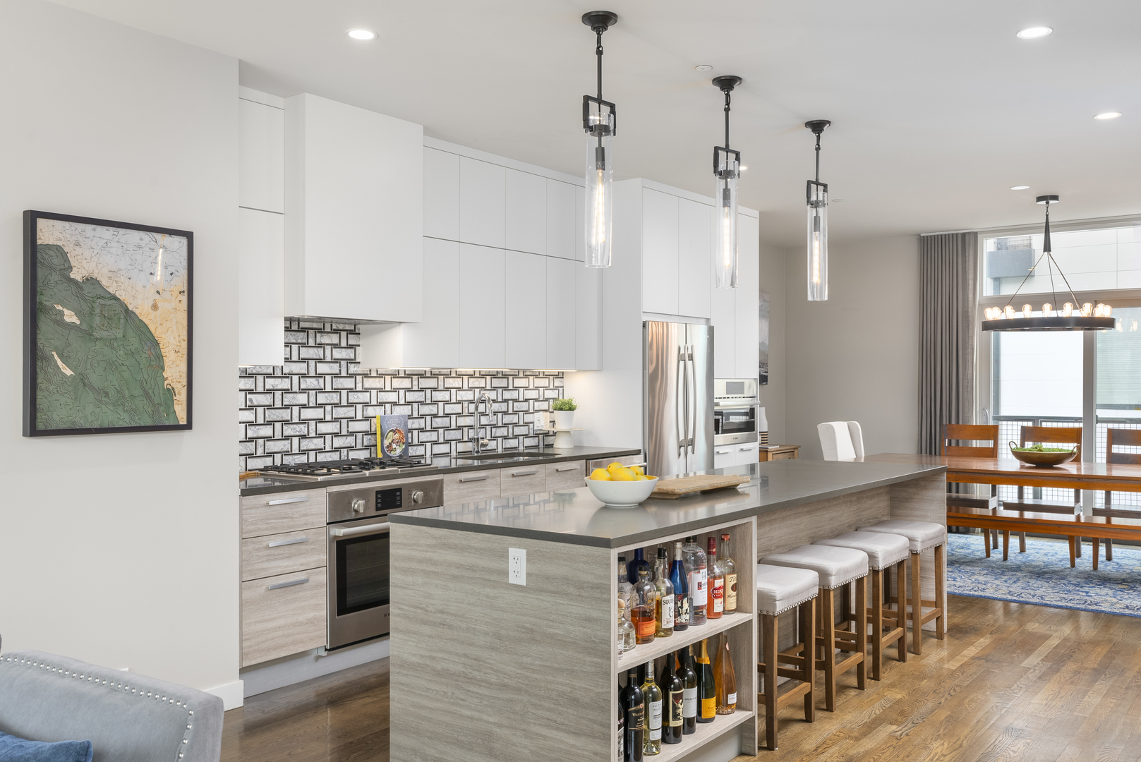 448 West Oak Street Chicago, IL 60610 - Photo 4 of 28 a kitchen with stainless steel appliances granite countertop a stove and a refrigerator