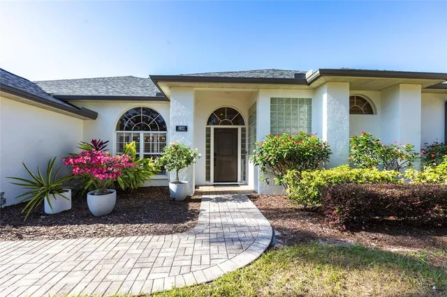 a front view of a house with a porch